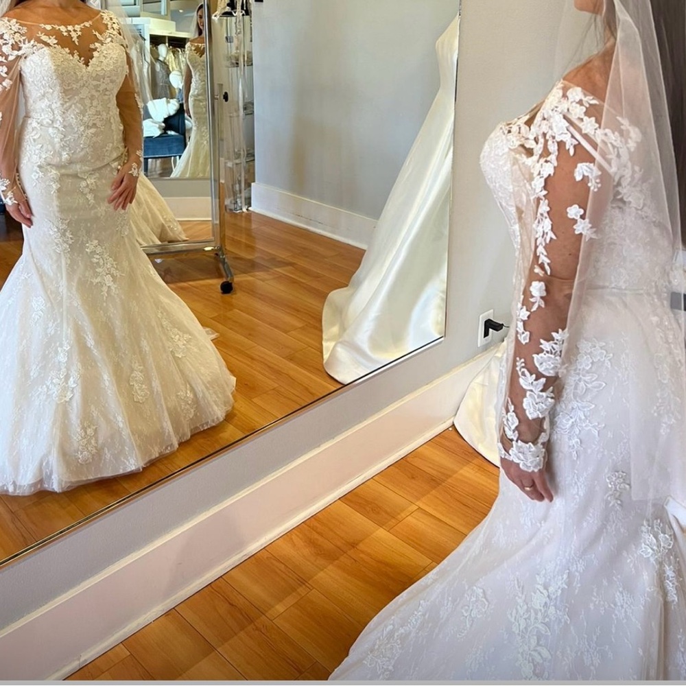 The perfect wedding dress from Barcelona never been used brand new